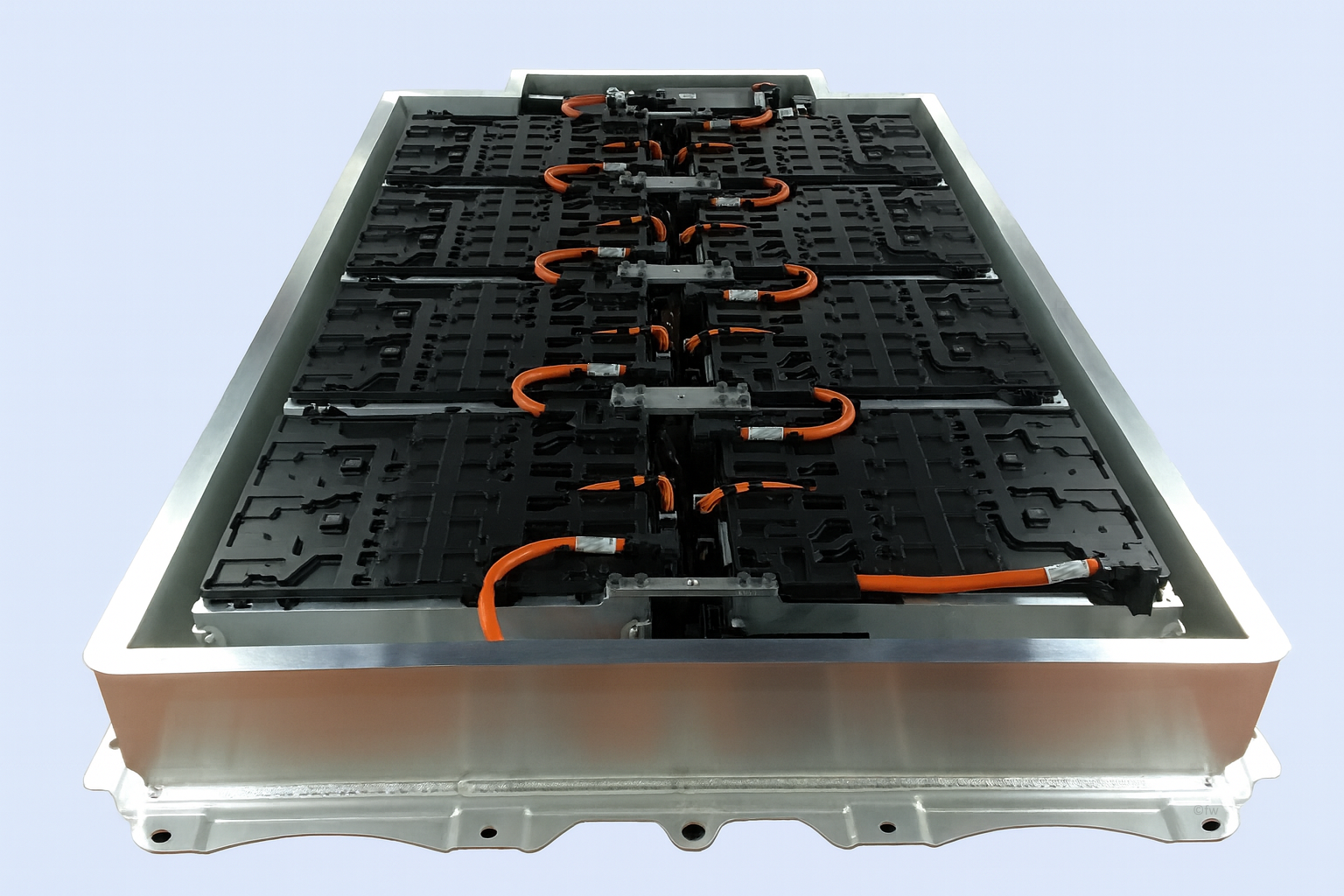 Opened high-voltage battery of an electric vehicle with modules and orange HV cables in aluminium housing.